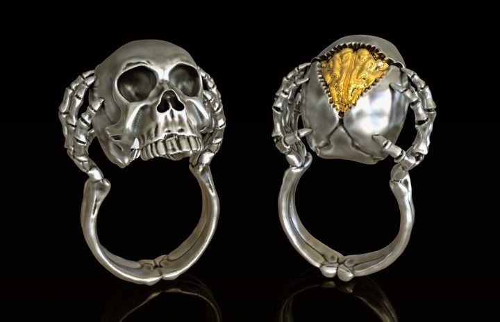 Skull ring with opal brain